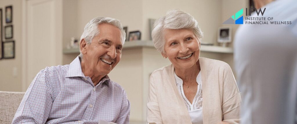 A financial advisor helping a couple plan for their retirement investments and goals