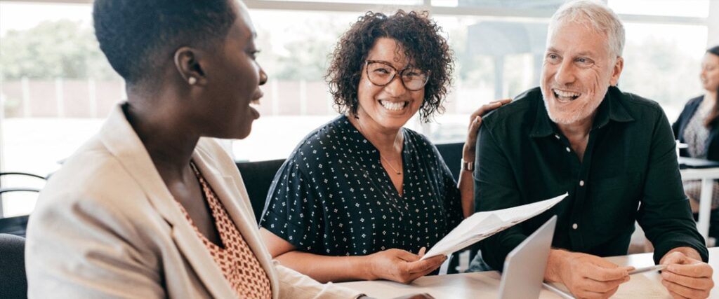 A financial planner helping a senior couple plan their finances for working after retirement