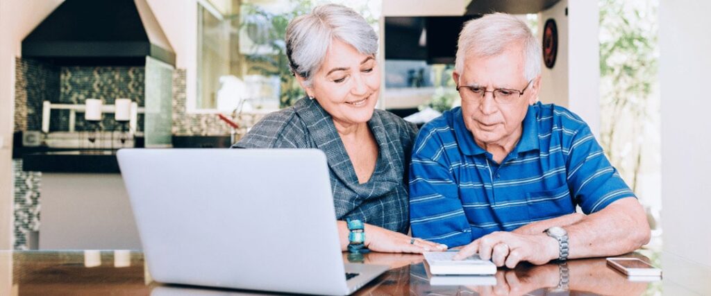 A senior couple discussing their retirement savings