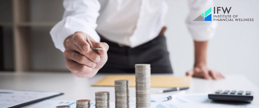 A woman looking at a chart of impact investing firms