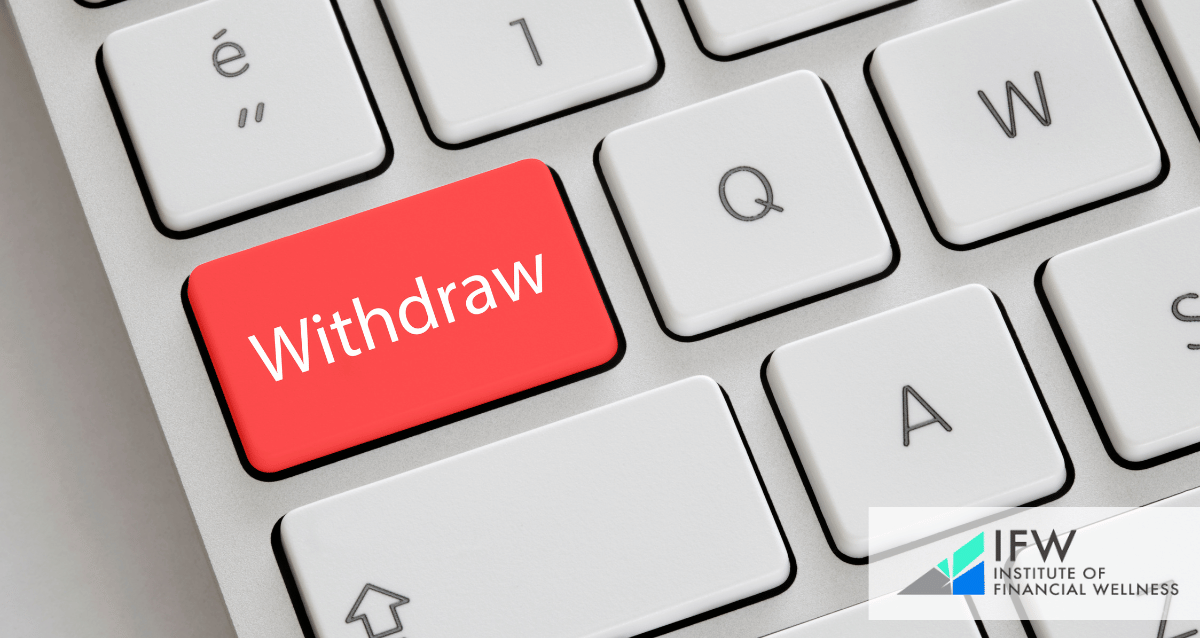 A keyboard with a key that reads "withdraw"