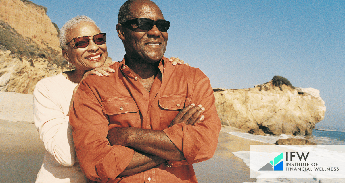 A couple happy about their retirement at the beach