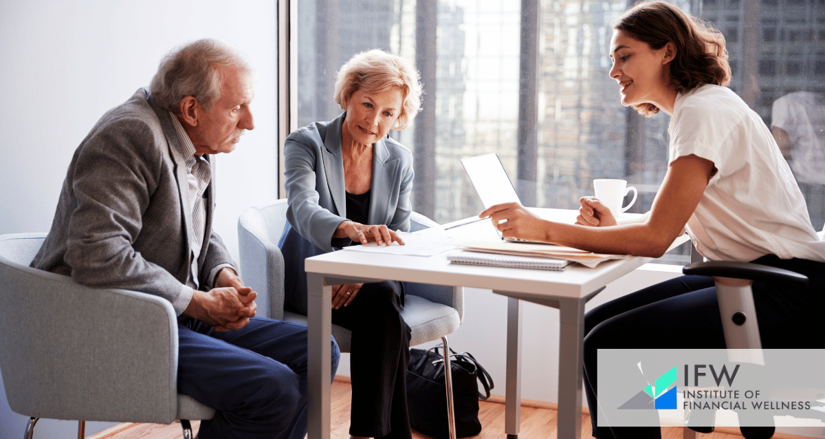 Two older people discussing their finances with a financial advisor