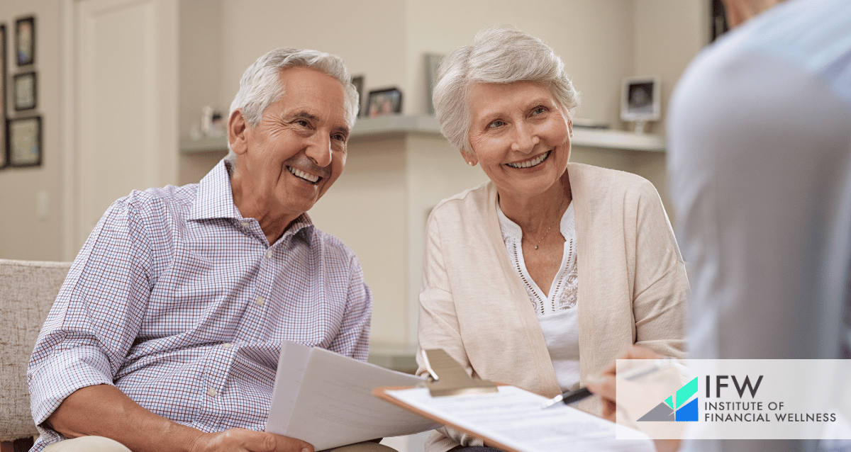 A photo of an older couple with a financial advisor