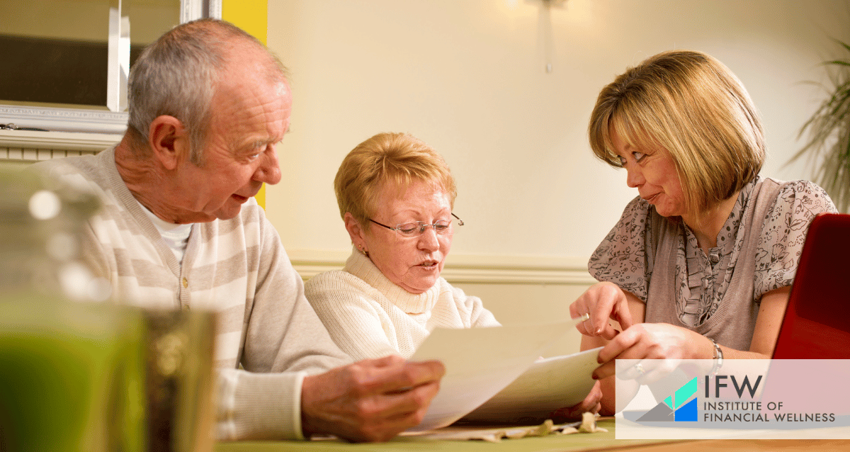 An elderly couple receiving financial advice