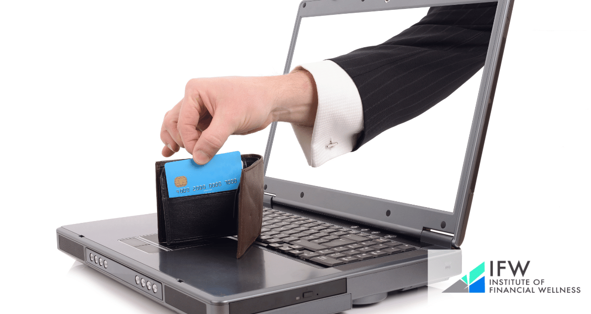 An image of an arm coming out of a computer screen and grabbing a credit card from a wallet