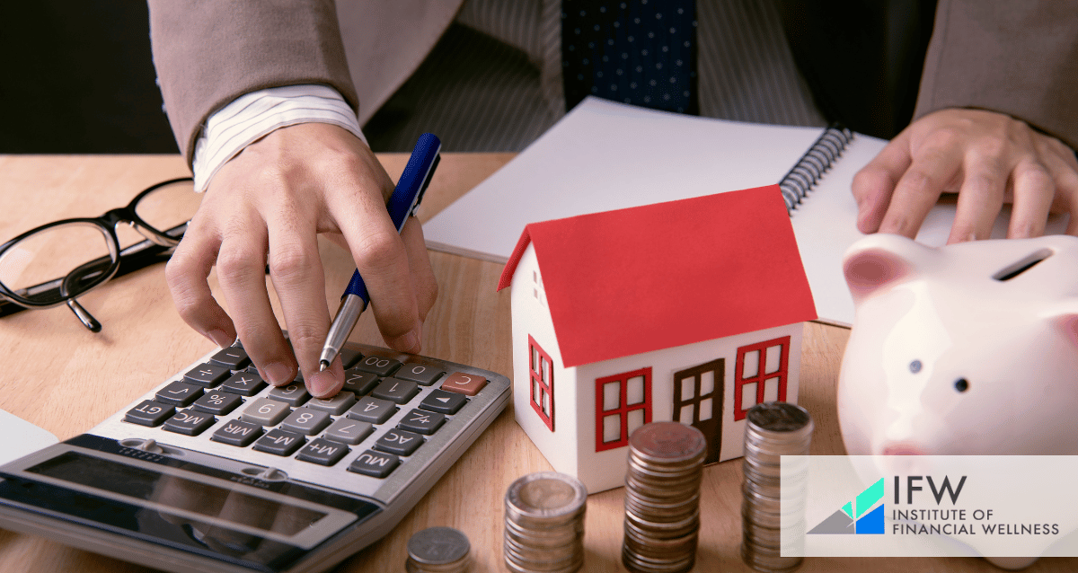 A person with a calculator, piggy bank, a toy house and coins