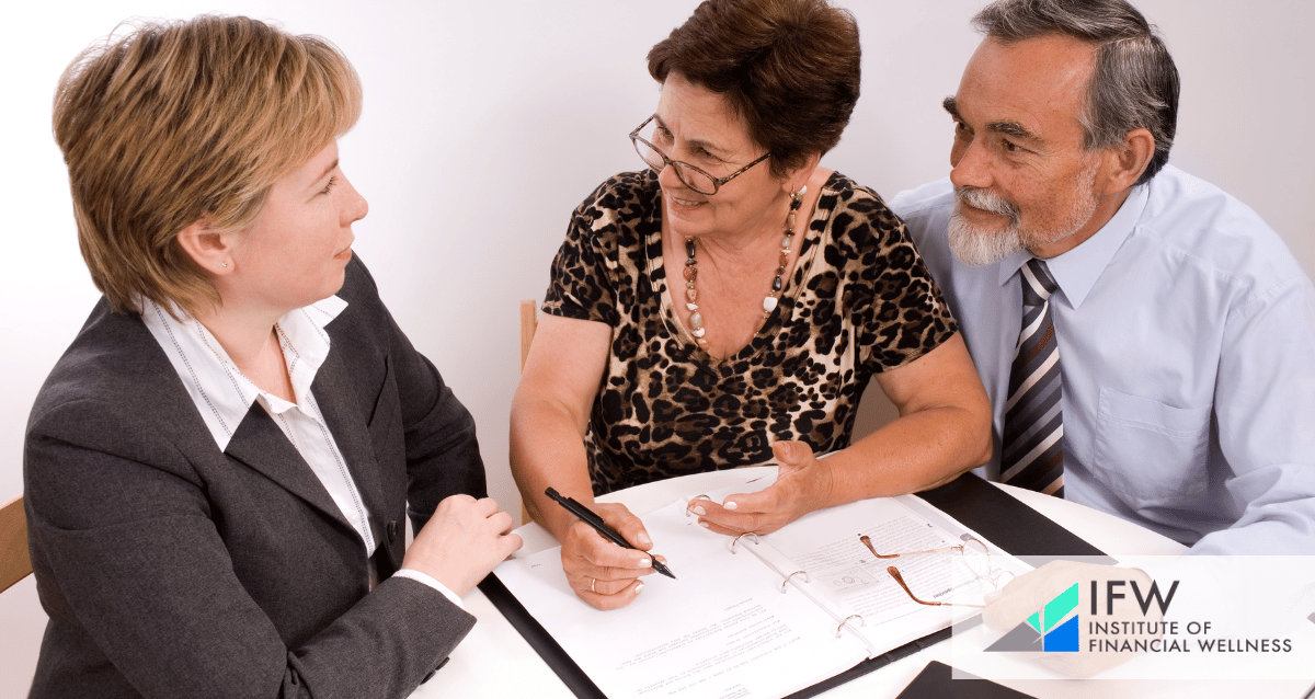 A couple speaking to a Certified Financial Planner