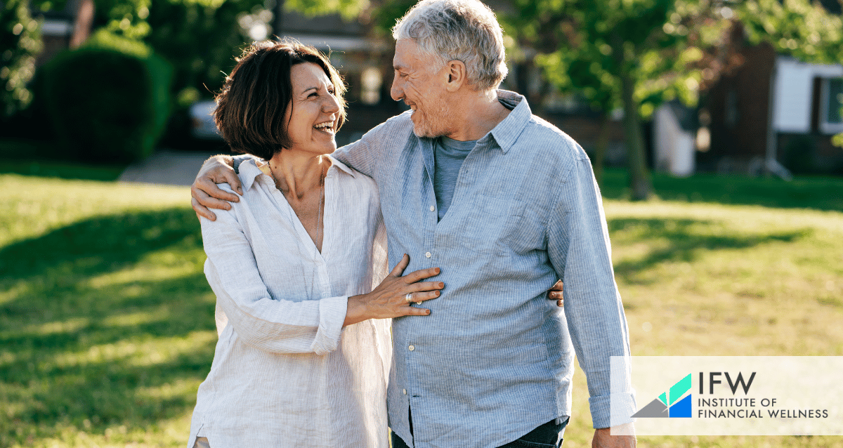 A couple walking on a sidewalk