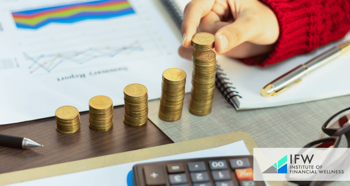 A person stacking coins