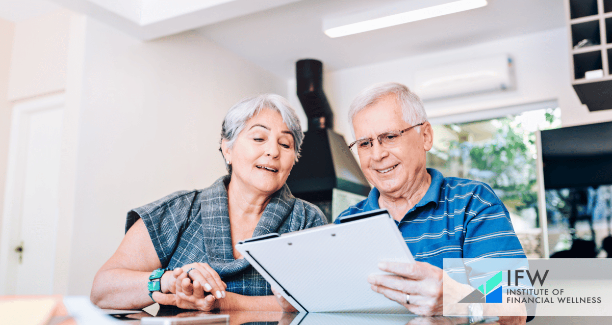 A married retired couple studying a piece of paper