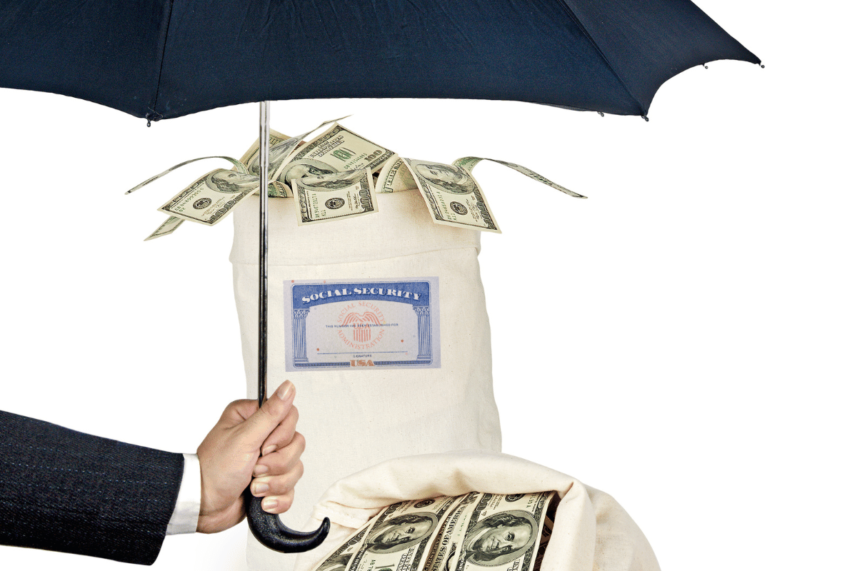 Canvas bag of maximized Social Security benefits under an umbrella