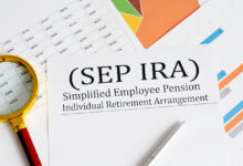 Paper with Simplified Employee Pension Individual Retirement Arrangement SEP IRA on a chart