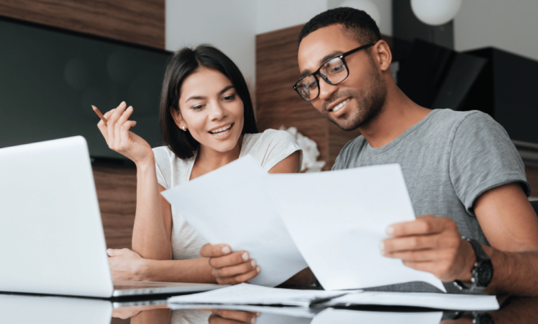 A couple reviewing their life insurance policy