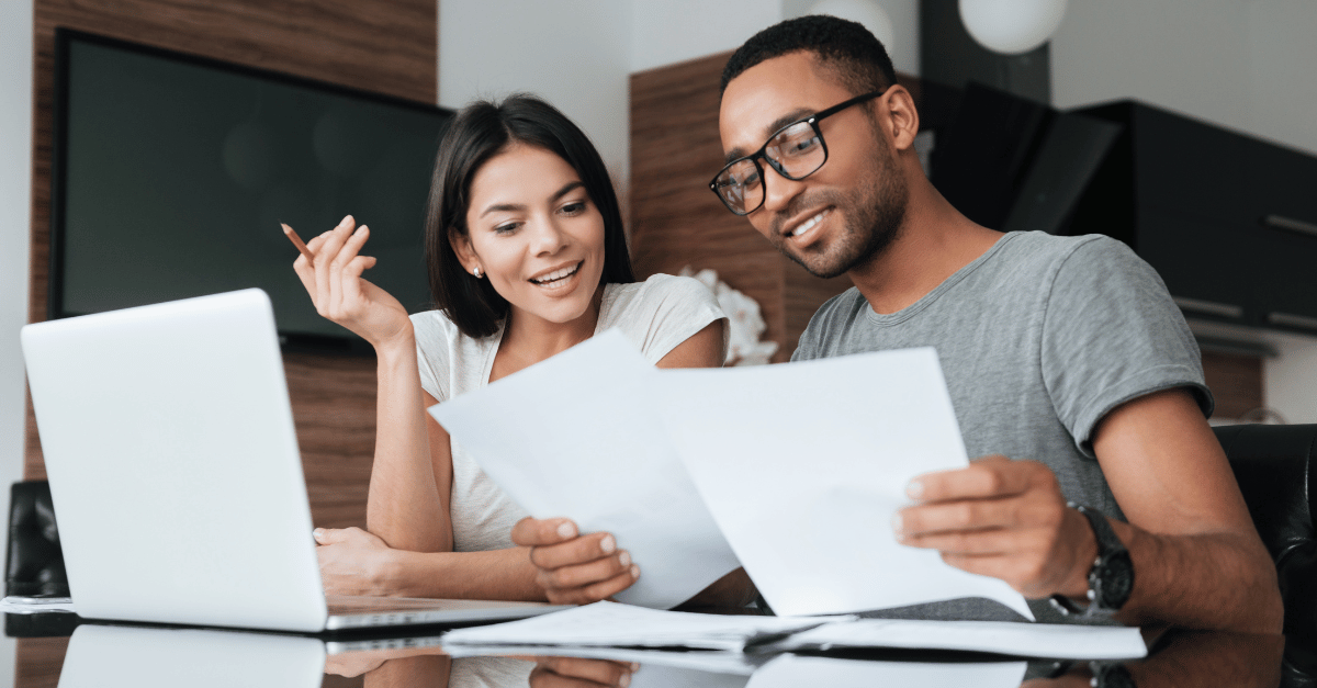 A couple reviewing their life insurance policy