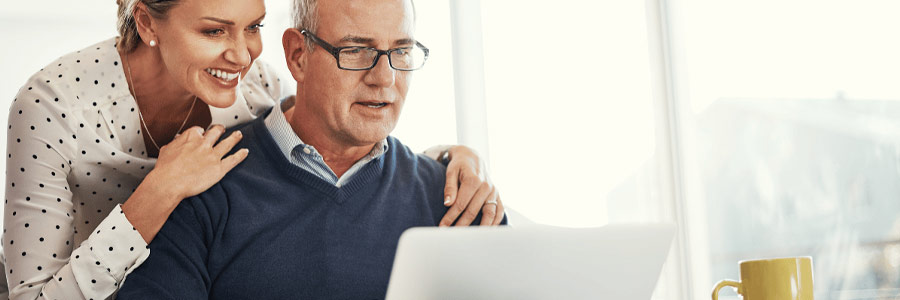 A person using a retirement calculator to plan their retirement